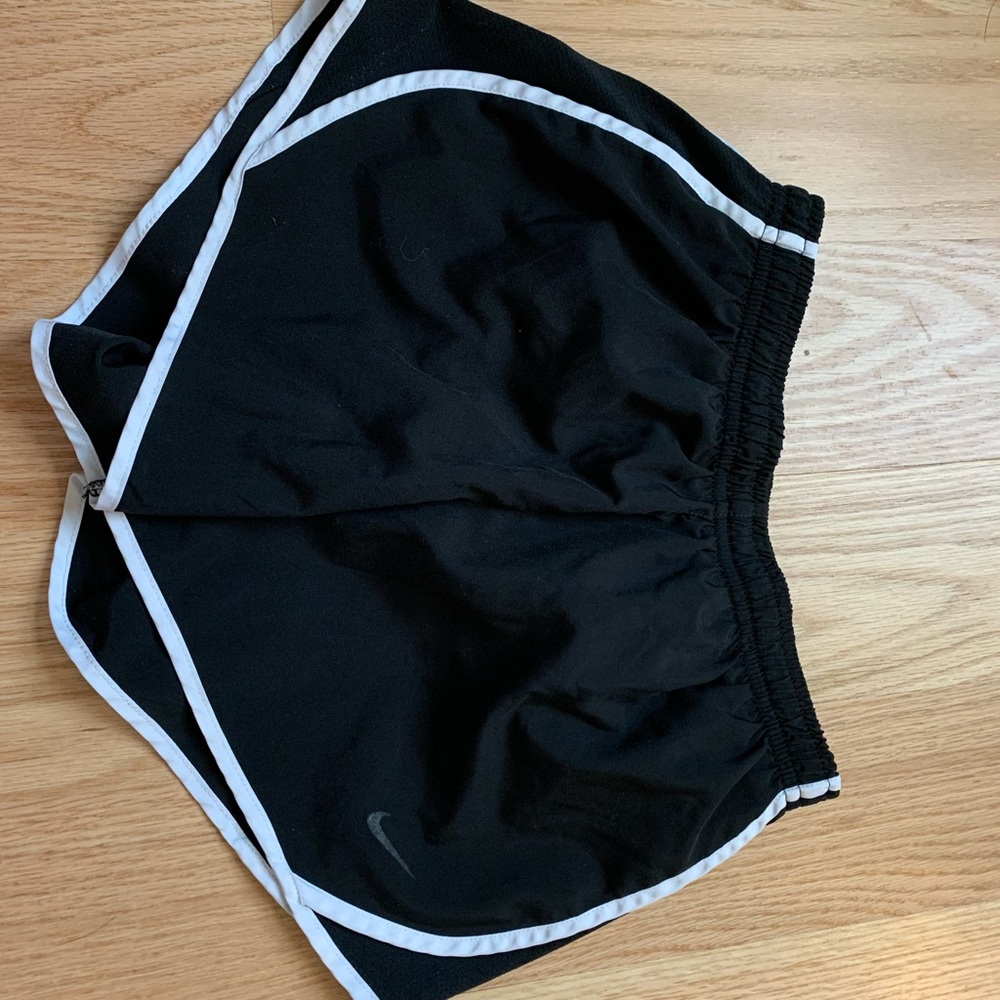 Girls medium black Nike shorts.